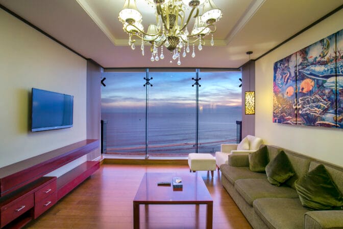 Each room features a private balcony, allowing guests to unwind while soaking in the picturesque surroundings.