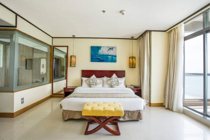 Each room features a private balcony, allowing guests to unwind while soaking in the picturesque surroundings.