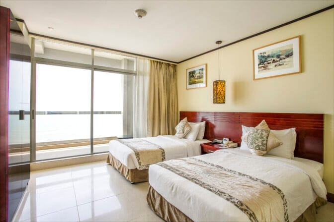 Each room features a private balcony, allowing guests to unwind while soaking in the picturesque surroundings.