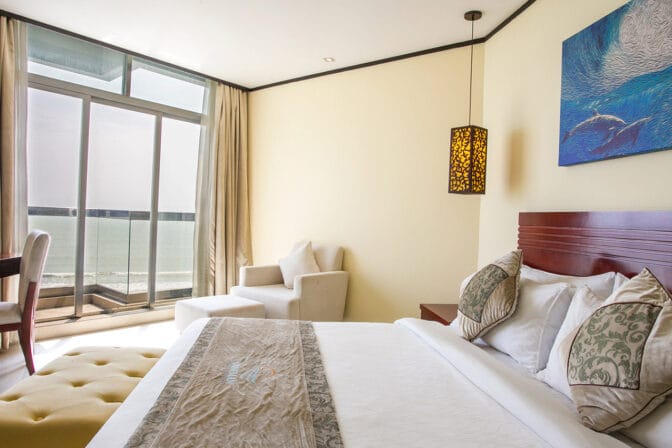 Each room features a private balcony, allowing guests to unwind while soaking in the picturesque surroundings.